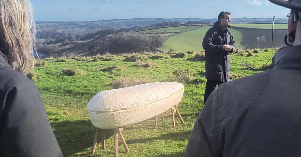 A mushroom coffin is launched at Sharpham Meadow by Loop Biotech & The Green Funeral Company