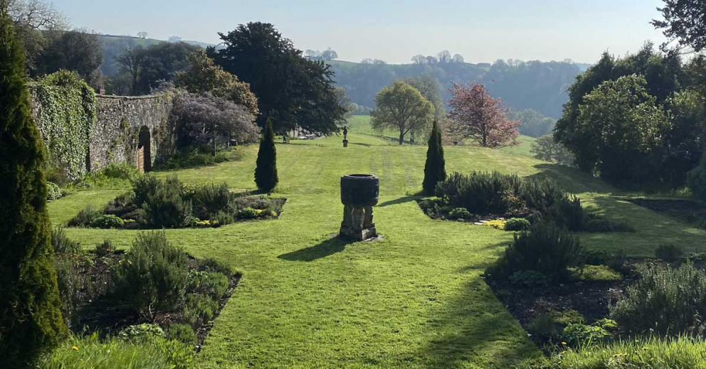 View of the Percy Cane formal gardens at The Sharpham Trust mindfulness retreat centre
