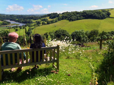 Looking down the Dart Valley from gardens near The Barn retreat venue on The Sharpham Estate