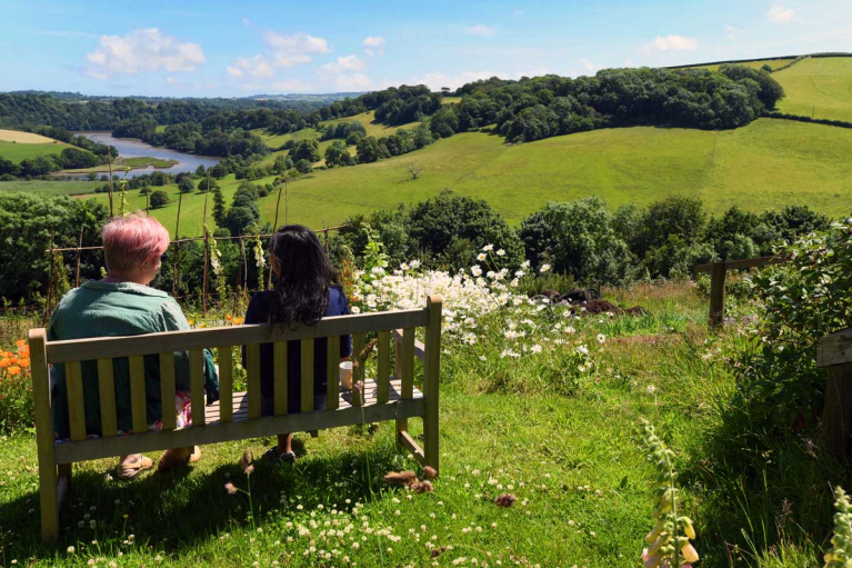 Looking down the Dart Valley from gardens near The Barn retreat venue on The Sharpham Estate