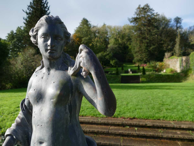 Statue of Flora in the formal gardens designed by Percy Cane at Sharpham House