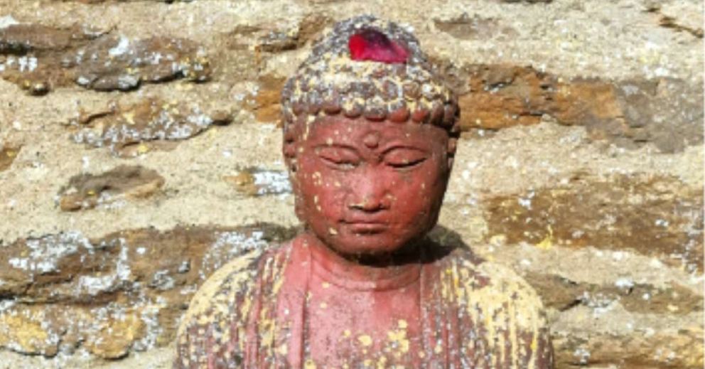 Buddha outside The Barn at The Sharpham Trust