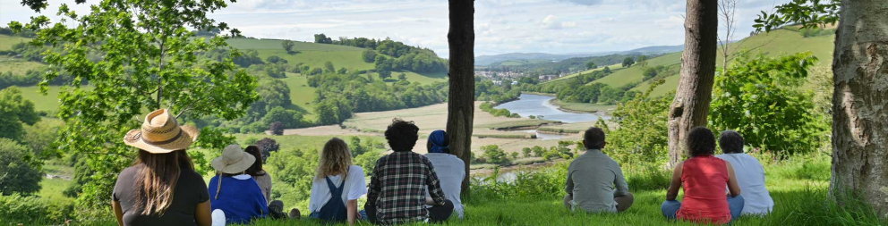 Coach House retreatants view rewilding fields 6-night