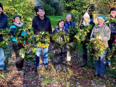 Volunteers at Sharpham who took part in Christmas wreath-making as a thank-you for their work throughout the year