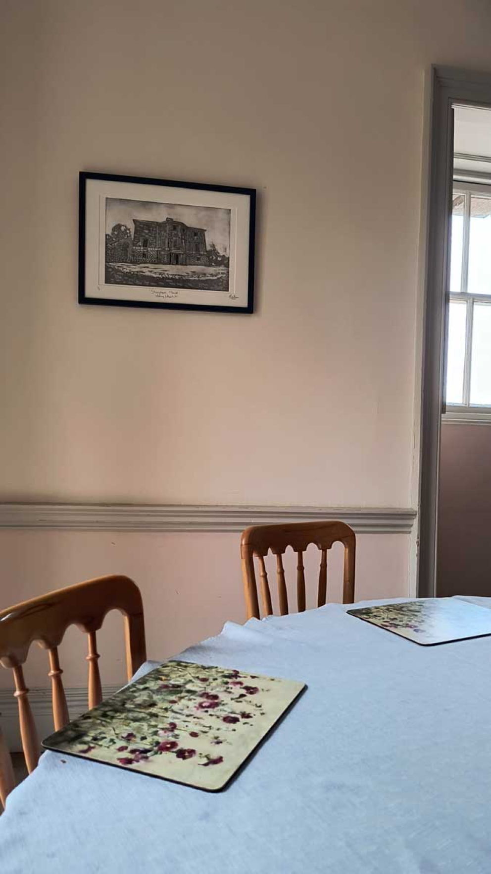Michael Crossan's artwork hanging in the Maurice Ash Room at The Sharpham Trust