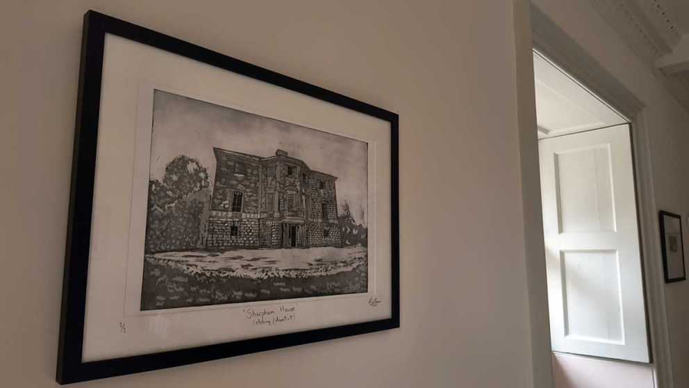 Michael Crossan's artwork hanging in the Maurice Ash Room at The Sharpham Trust