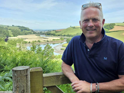 Presenter Jules Hudson with our rewilding fields behind for the BBC's Escape to the Country property show