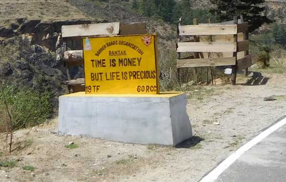 Bhutan billboard - witnessed by Sharpham Trust Director Julian Carnell on his visit to Bhutan