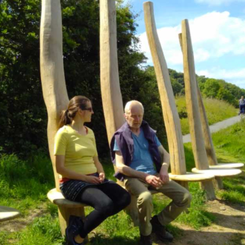 The completed Green Oak Bench on the Sharpham Estate, inhabited by Maya Herbolzheimer and wood artist Peter Lanyon