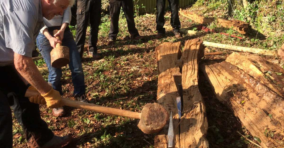 Volunteers begin work on the Green Oak Bench with wood artist Peter Lanyon on the Sharpham Estate