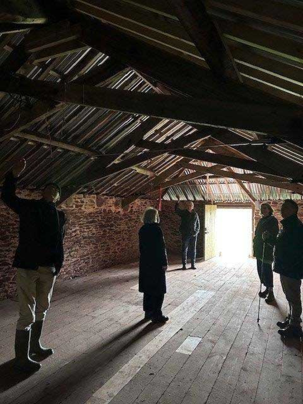 The restored Devon linhay barn at Point Field on the Sharpham Estate