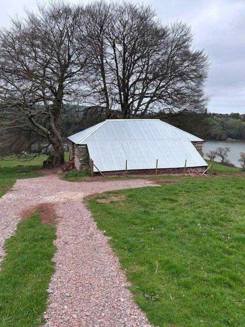 The restored Devon linhay barn at Point Field on the Sharpham Estate