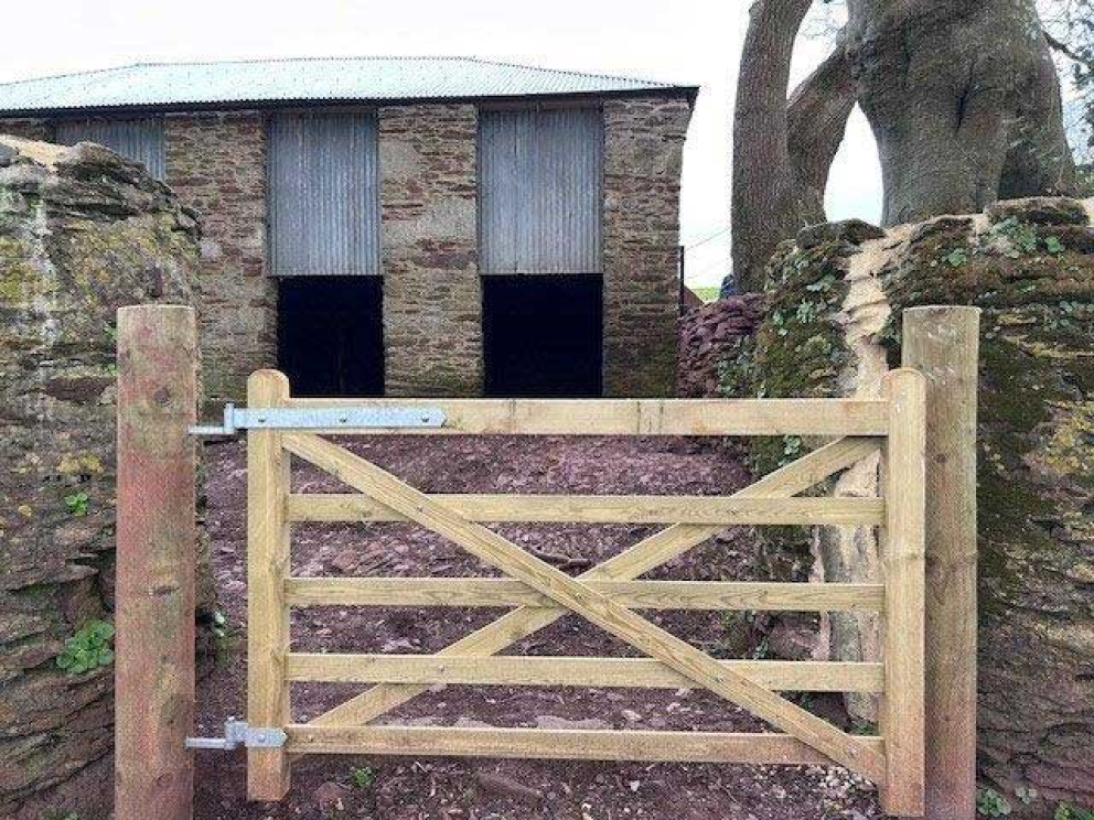 The restored Devon linhay barn at Point Field on the Sharpham Estate
