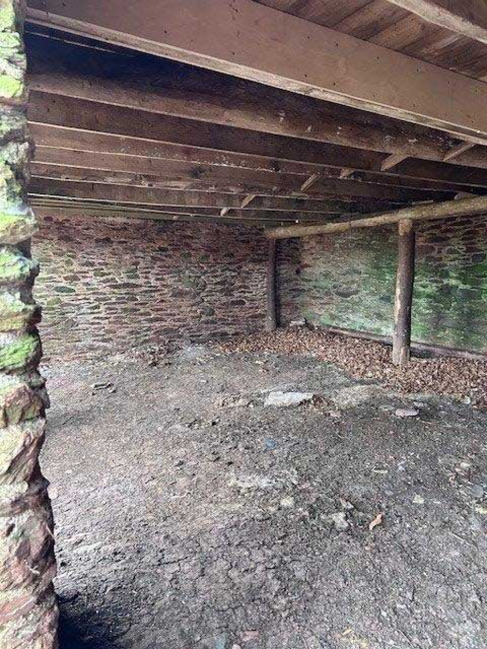 The restored Devon linhay barn at Point Field on the Sharpham Estate