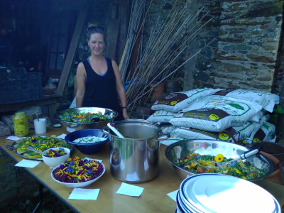 Head Gardener Bryony Middleton presides over the Harvest Feast in the Walled Garden at Sharpham House