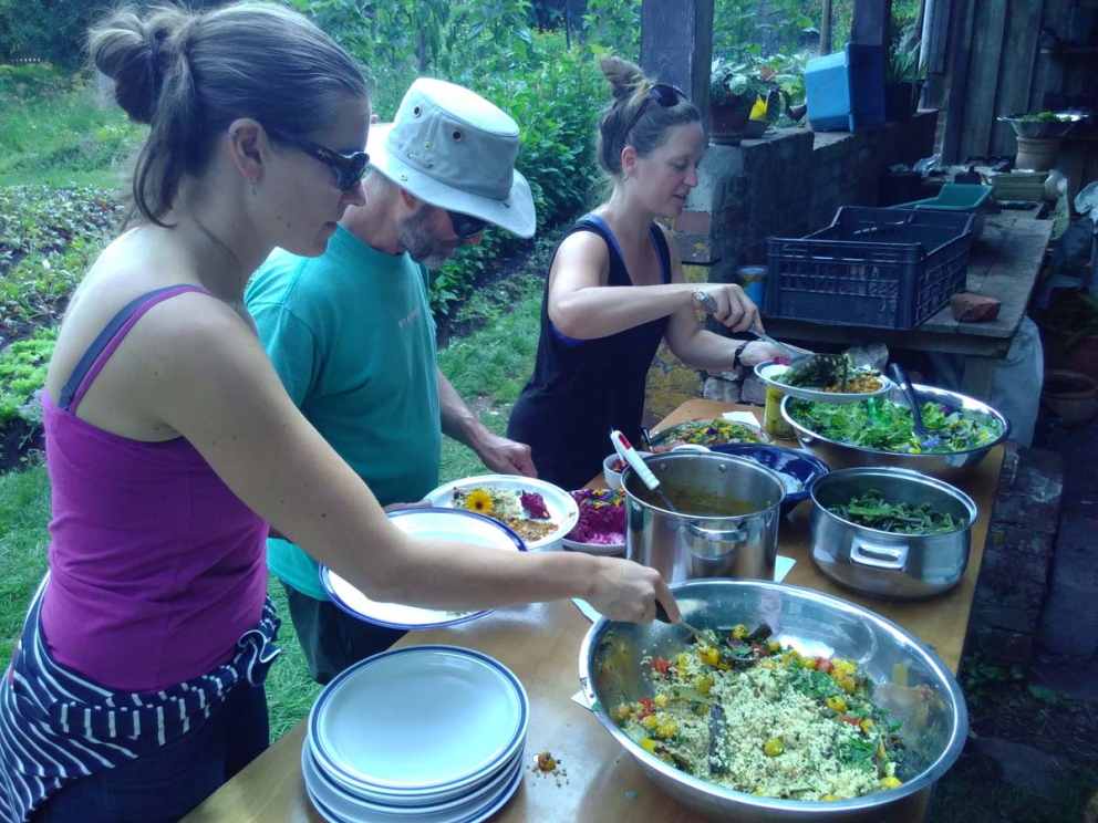 Volunteers enjoy a Harvest Feast in the Walled Garden at Sharpham House