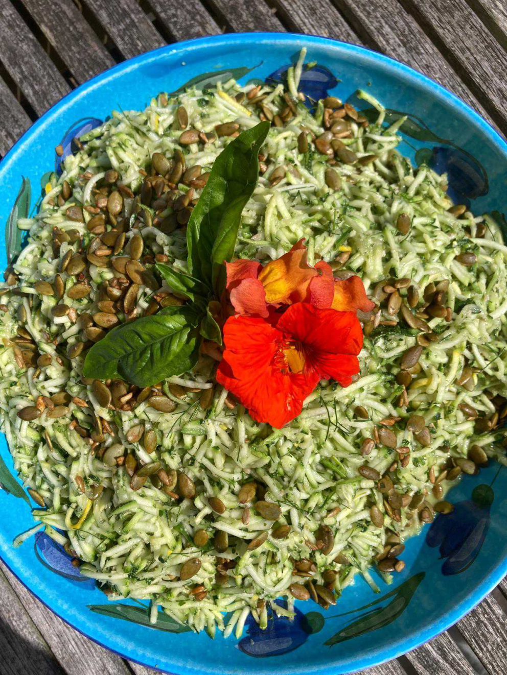 Courgette and basil vegan pesto salad, served on the sunny South Terrace at Sharpham House