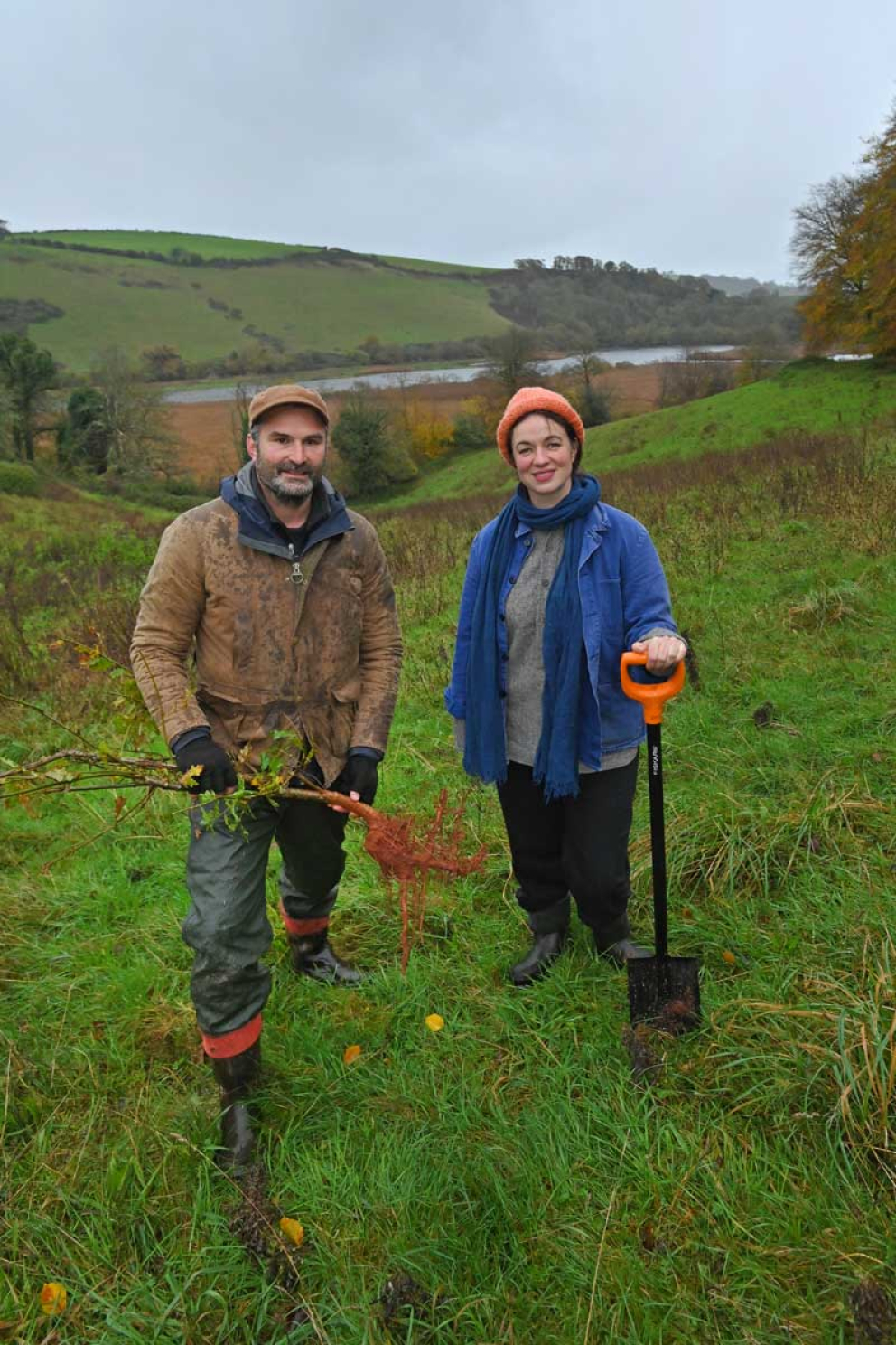Frances Tophill & Jack Skuse plant an oak tree on the Sharpham Estate for National Tree Week