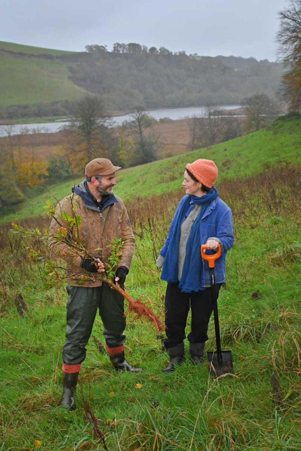 Frances Tophill & Jack Skuse plant an oak tree on the Sharpham Estate for National Tree Week