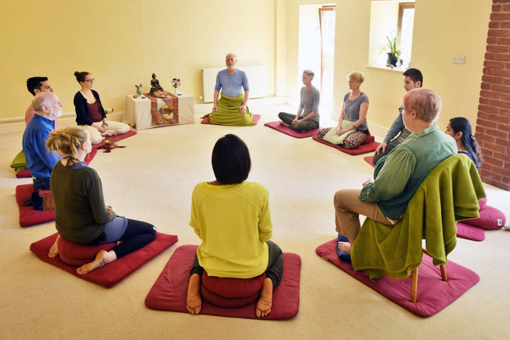 Meditating together at The Barn at The Sharpham Trust mindfulness retreat centre