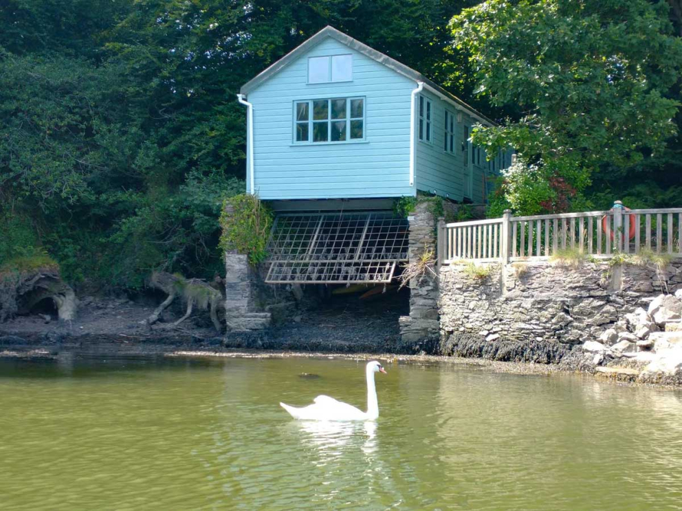The Boat House is on the banks of the River Dart at Sharpham