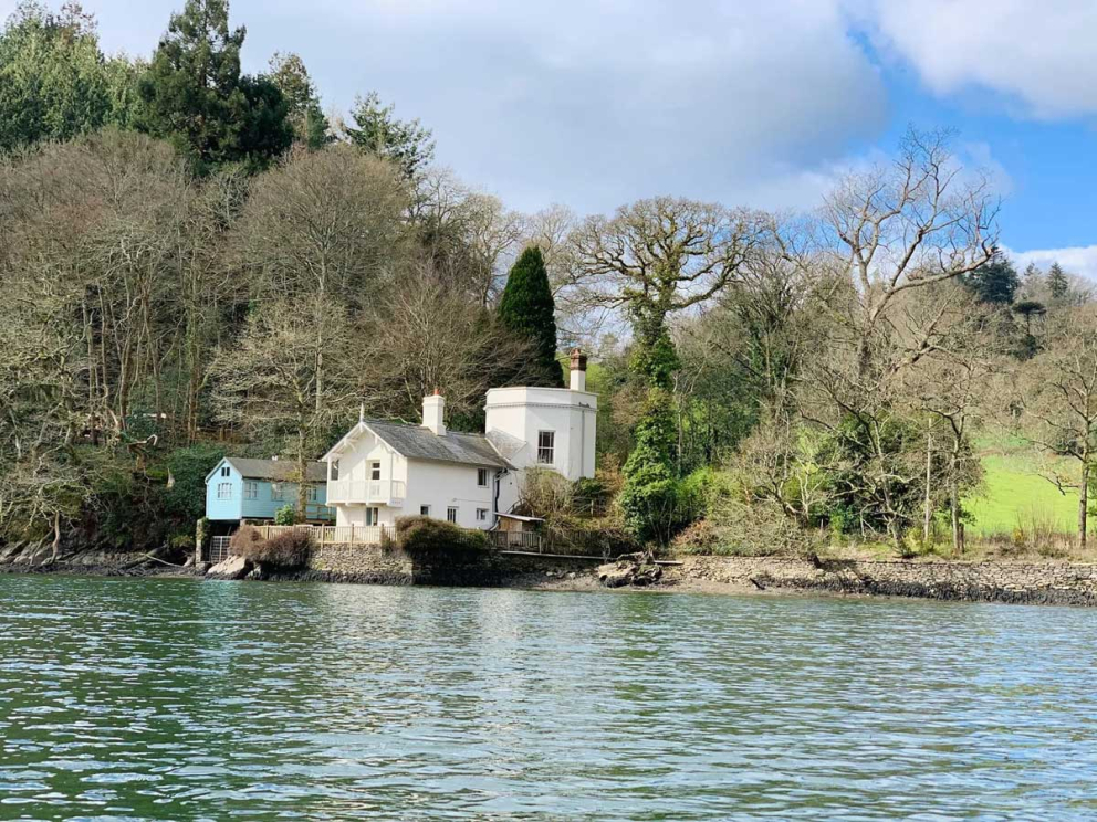 The Boat House, besides the historic Bathing House on the River Dart at Sharpham