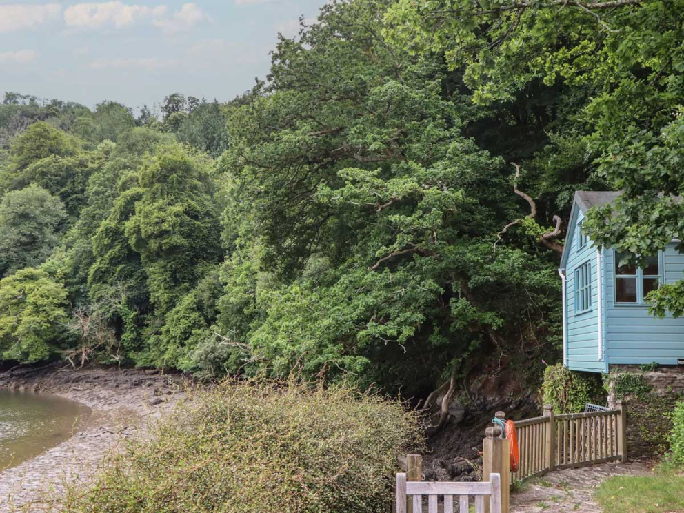 The Boat House is on the banks of the River Dart at Sharpham