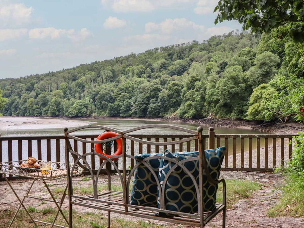 Watch the river from the garden of The Boat House on the River Dart at Sharpham